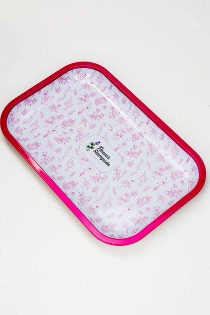 Roll in style with the Flower Stampede Rolling Tray. Featuring our Signature Floral Pattern in pink and white,