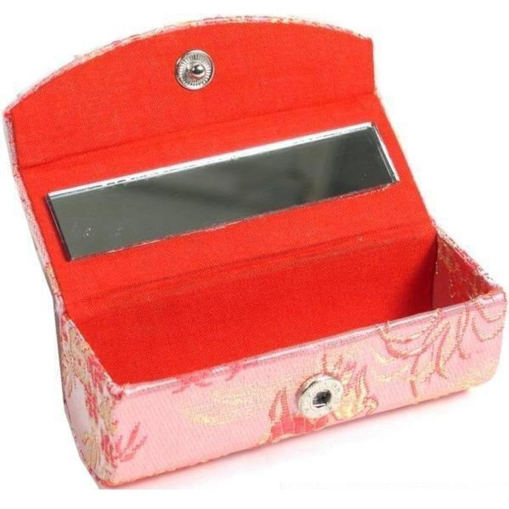Glam mirrored lipstick case holds your pipe discreetly.